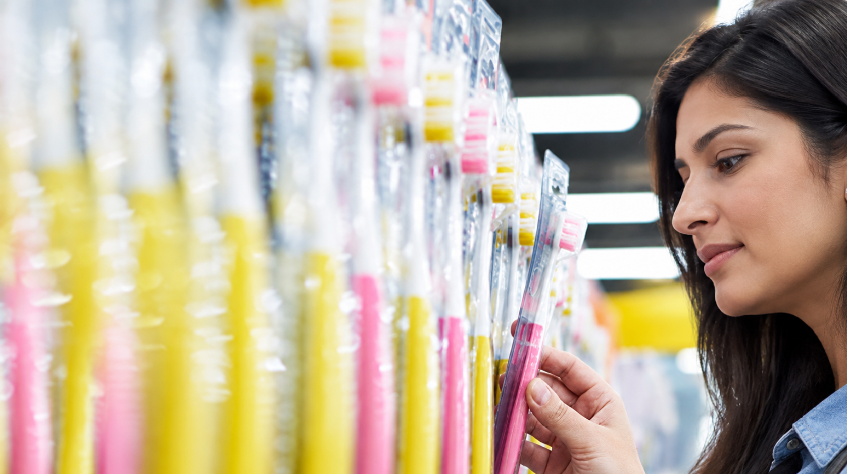 Generated image Woman Inspecting Colorful Toothbrushes 2